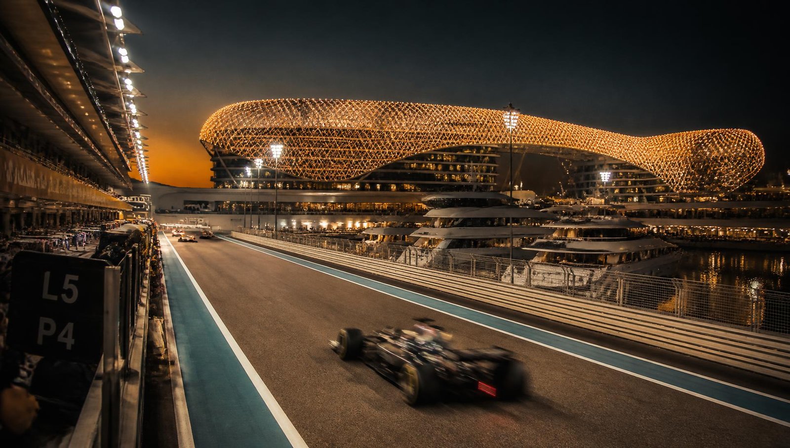 Yas Marina Circuit pit straight lit at night during the Abu Dhabi Grand Prix
